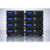 MK-312BT Production Batch and Quality Control Testing Ten MK-312BT electrostimulation devices arranged in a production batch during final assembly and quality control testing with illuminated LCD displays and status indicators.