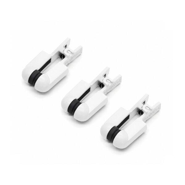 Three white conductive electrode clamps with black contact pads